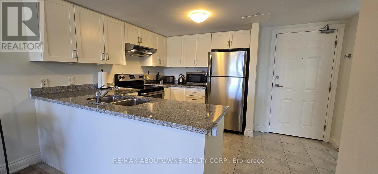 402 - 64 Frederick Drive, Guelph, ON - Indoor Photo Showing Kitchen With Stainless Steel Kitchen With Double Sink