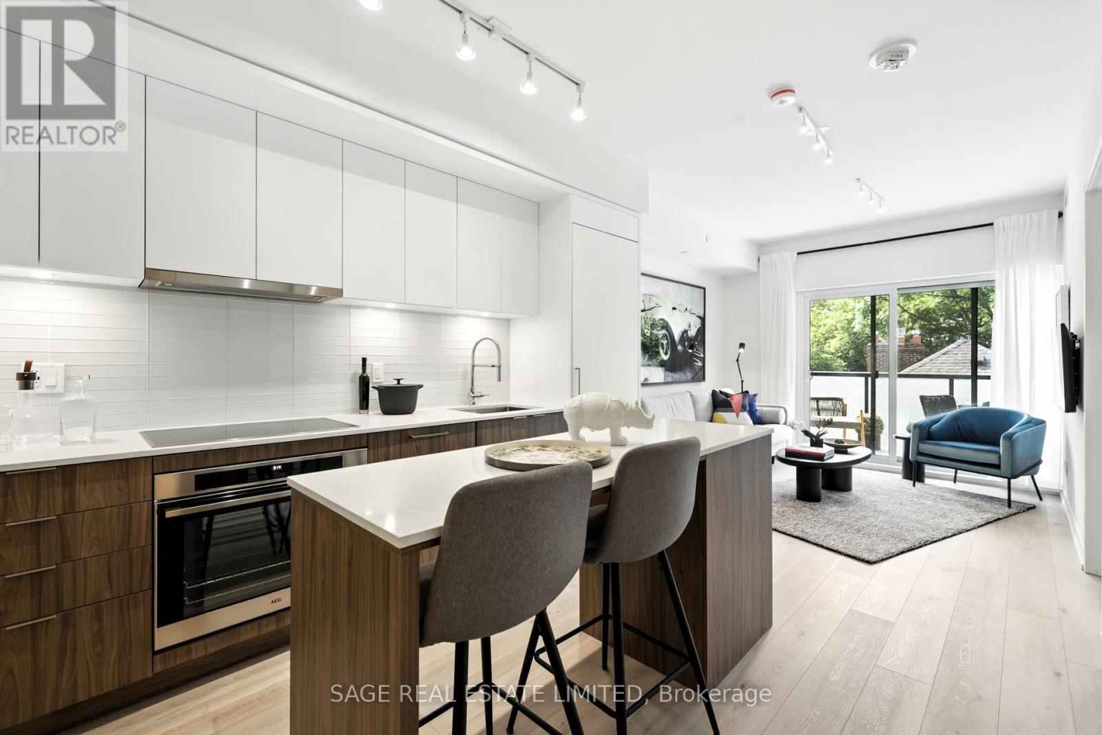 206 - 863 St Clair Avenue W, Toronto, ON - Indoor Photo Showing Kitchen With Upgraded Kitchen