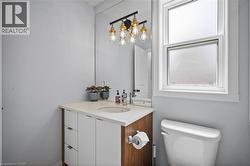 Bathroom with vanity and toilet -