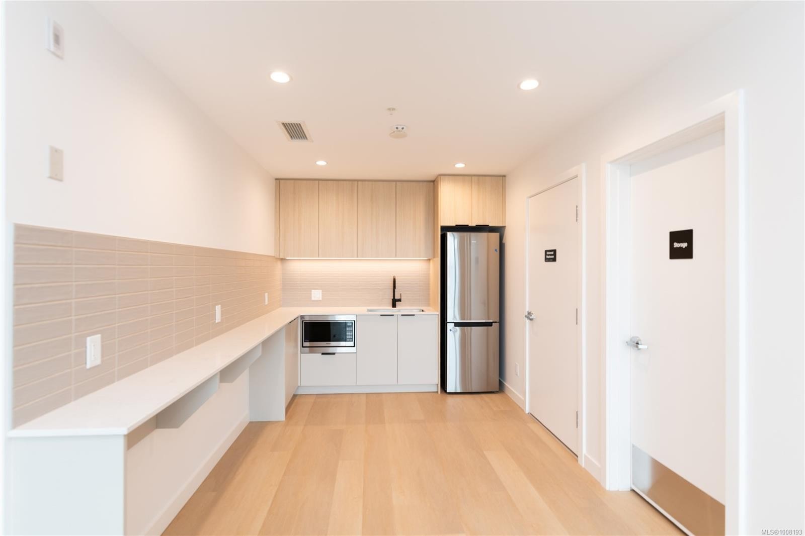 102-3564 A Ryder Hesjedal Way, Colwood, BC - Indoor Photo Showing Kitchen With Stainless Steel Kitchen