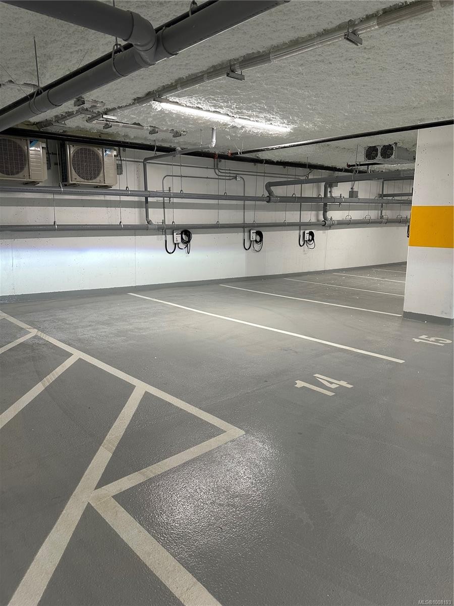 102-3564 A Ryder Hesjedal Way, Colwood, BC - Indoor Photo Showing Garage