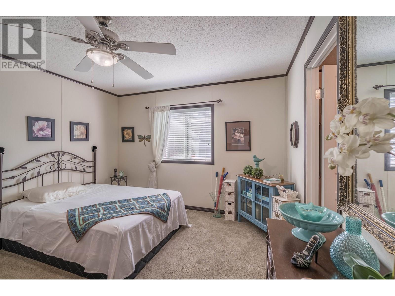 50 208 8Th Street, 100 Mile House, BC - Indoor Photo Showing Bedroom