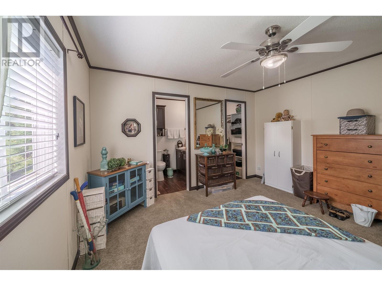 50 208 8Th Street, 100 Mile House, BC - Indoor Photo Showing Bedroom