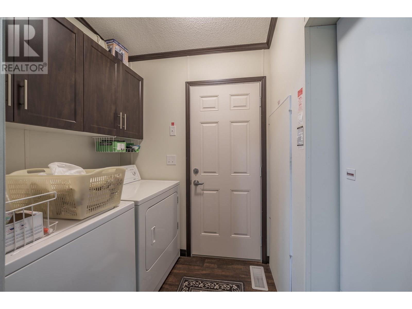 50 208 8Th Street, 100 Mile House, BC - Indoor Photo Showing Laundry Room