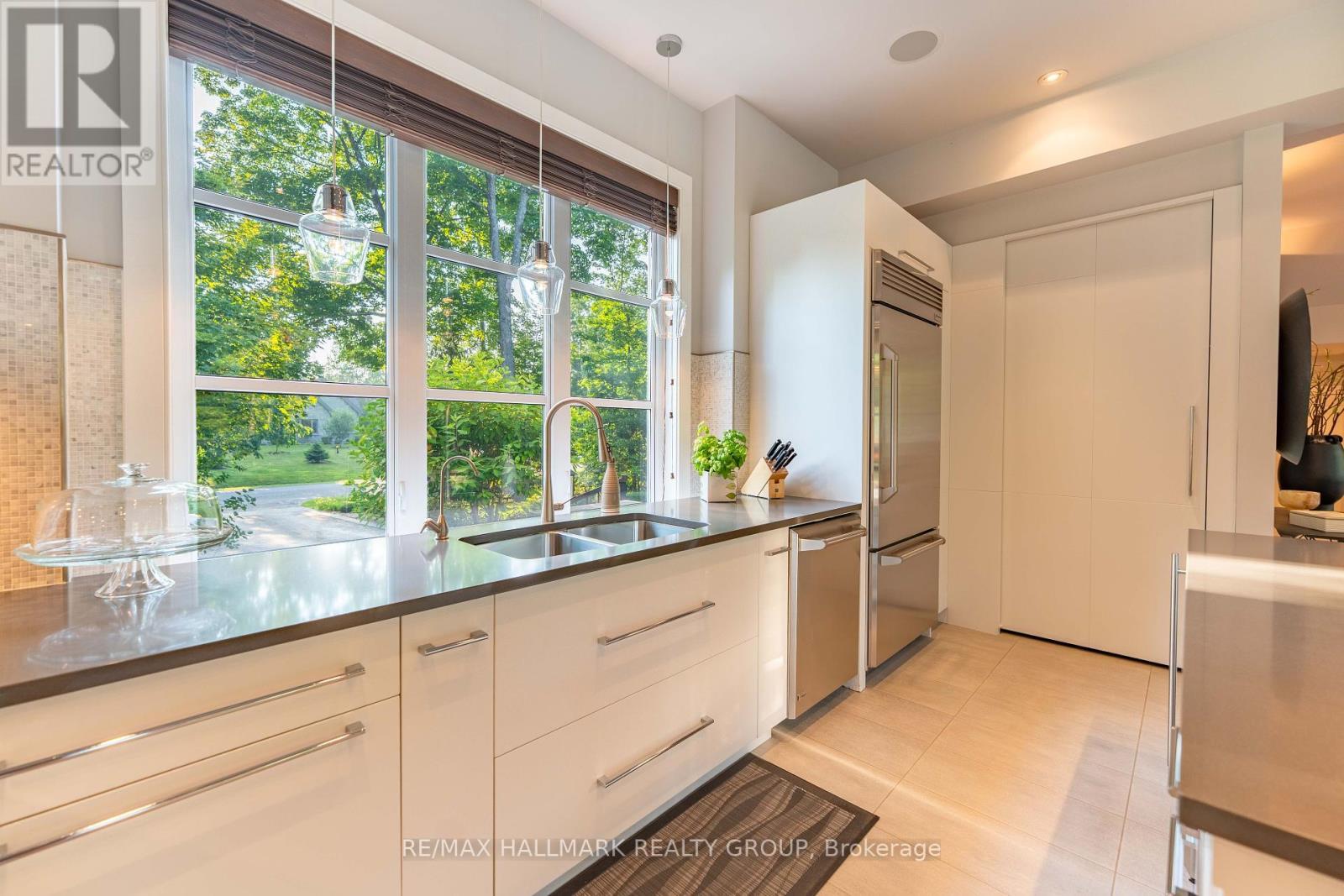 39 Jacquot Street, Champlain, ON - Indoor Photo Showing Kitchen With Double Sink
