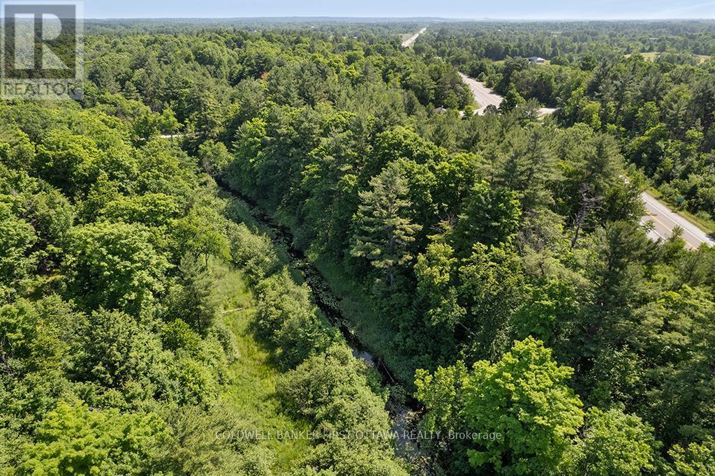 ...to access both sides of the lot - 115 Doran Road, Tay Valley, ON