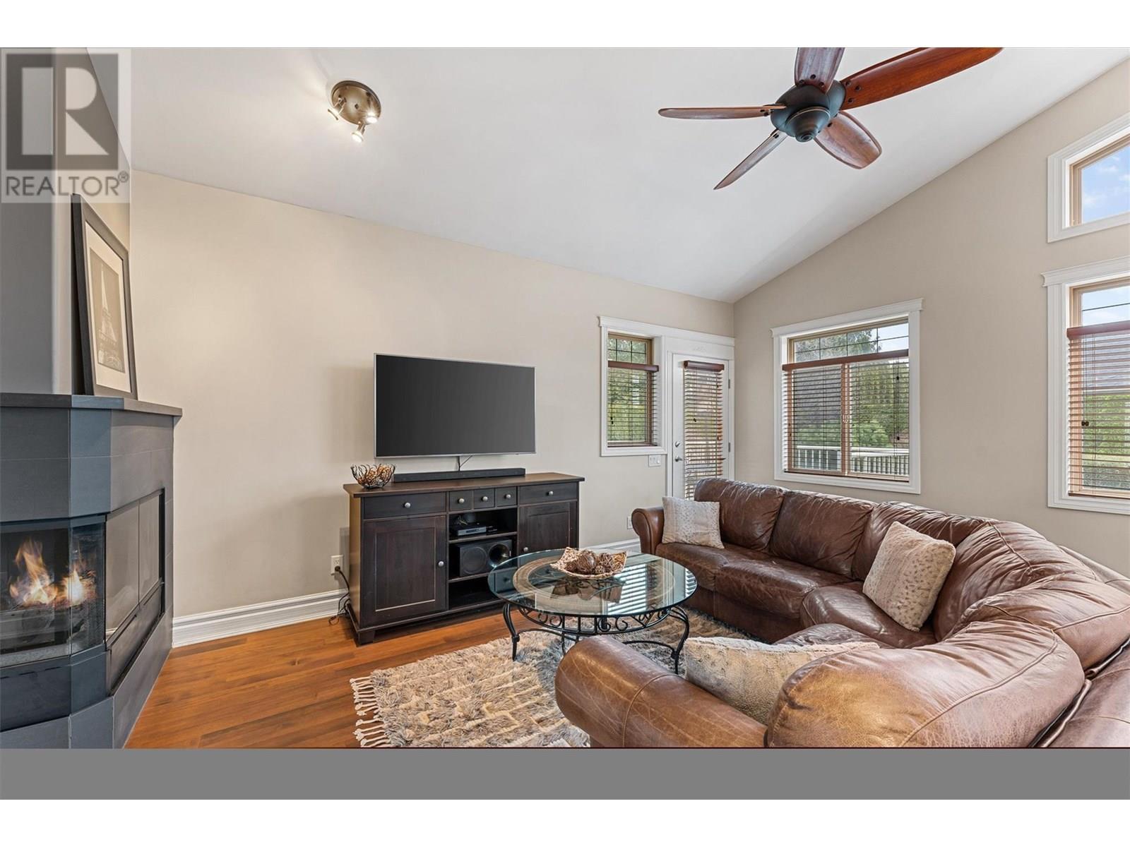 3079 Thacker Drive, West Kelowna, BC - Indoor Photo Showing Living Room With Fireplace