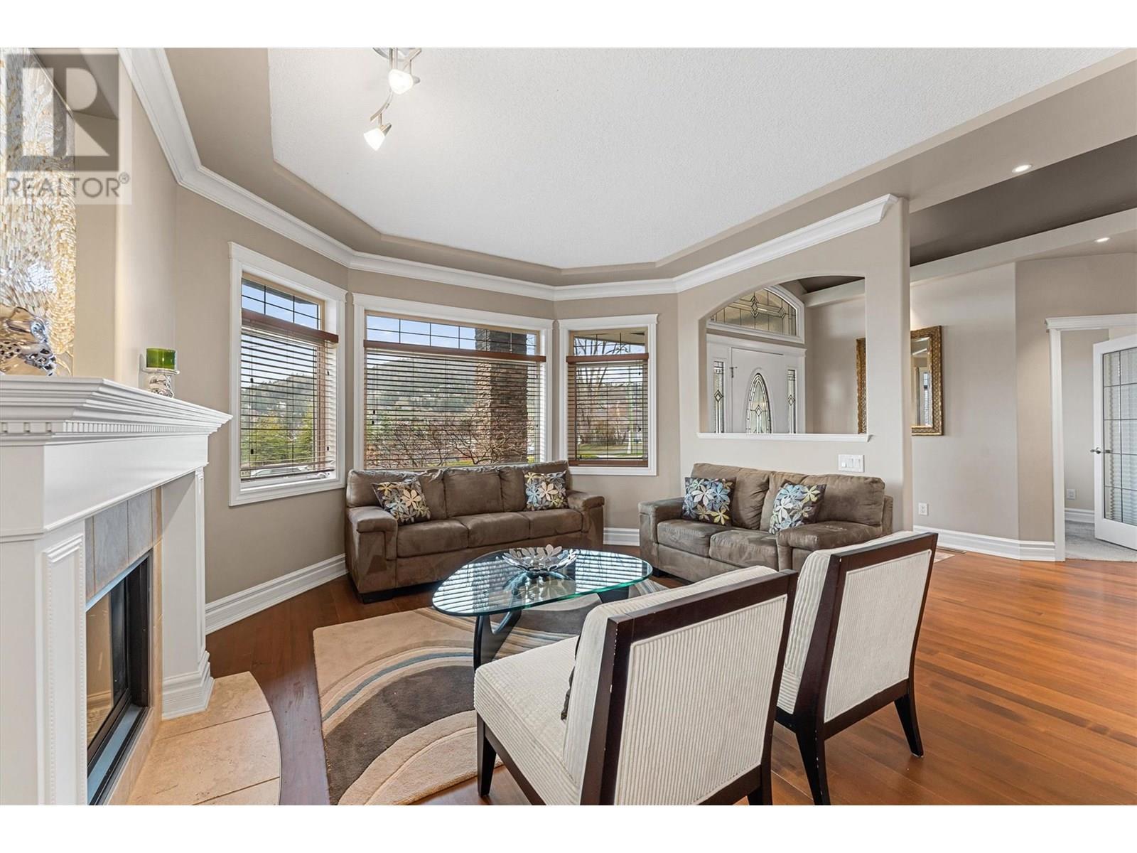 3079 Thacker Drive, West Kelowna, BC - Indoor Photo Showing Living Room With Fireplace