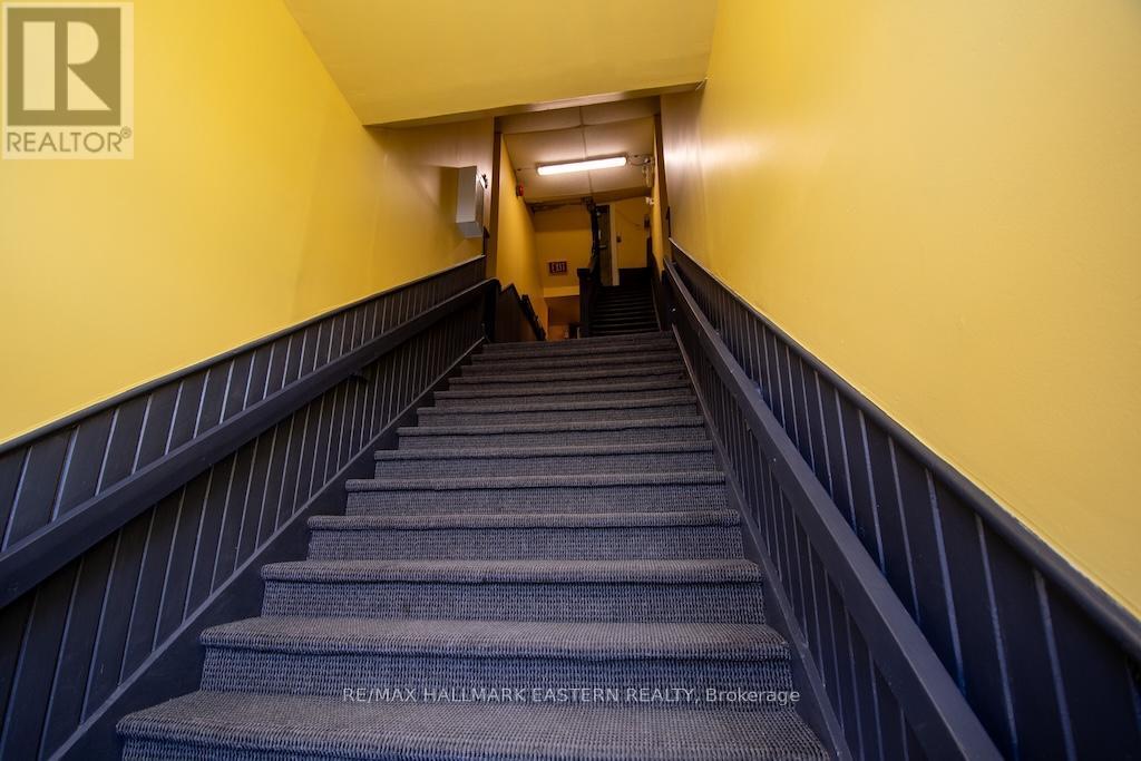 Stairs to Upper Apartments - 197 Hunter Street W, Peterborough (Town Ward 3), ON