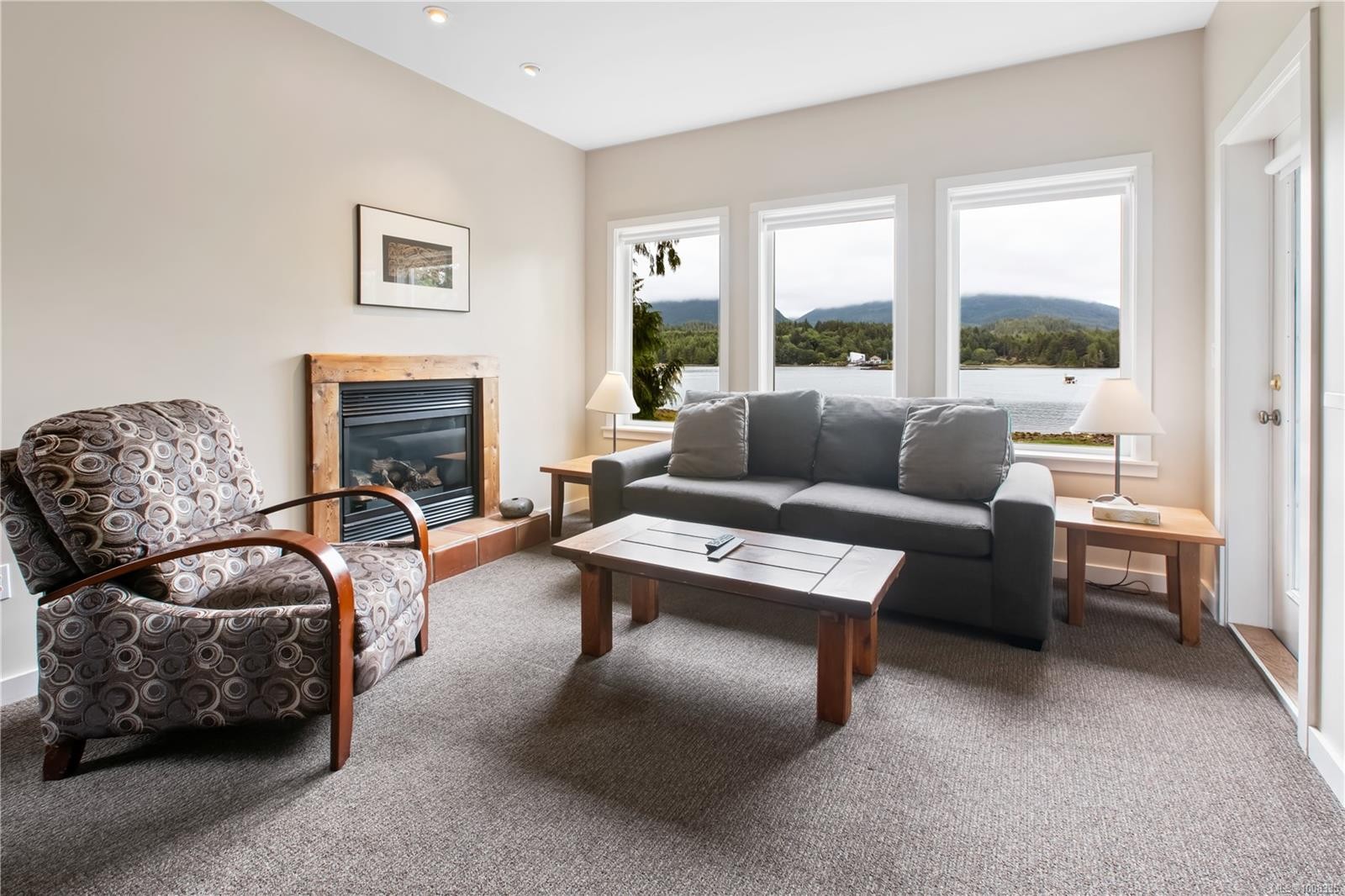 402-1971 Harbour Dr, Ucluelet, BC - Indoor Photo Showing Living Room With Fireplace