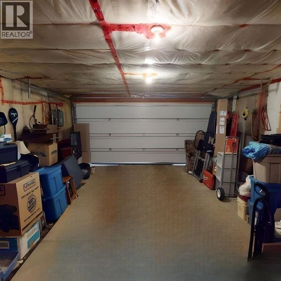 7673 Graham Road, Bridge Lake, BC - Indoor Photo Showing Garage