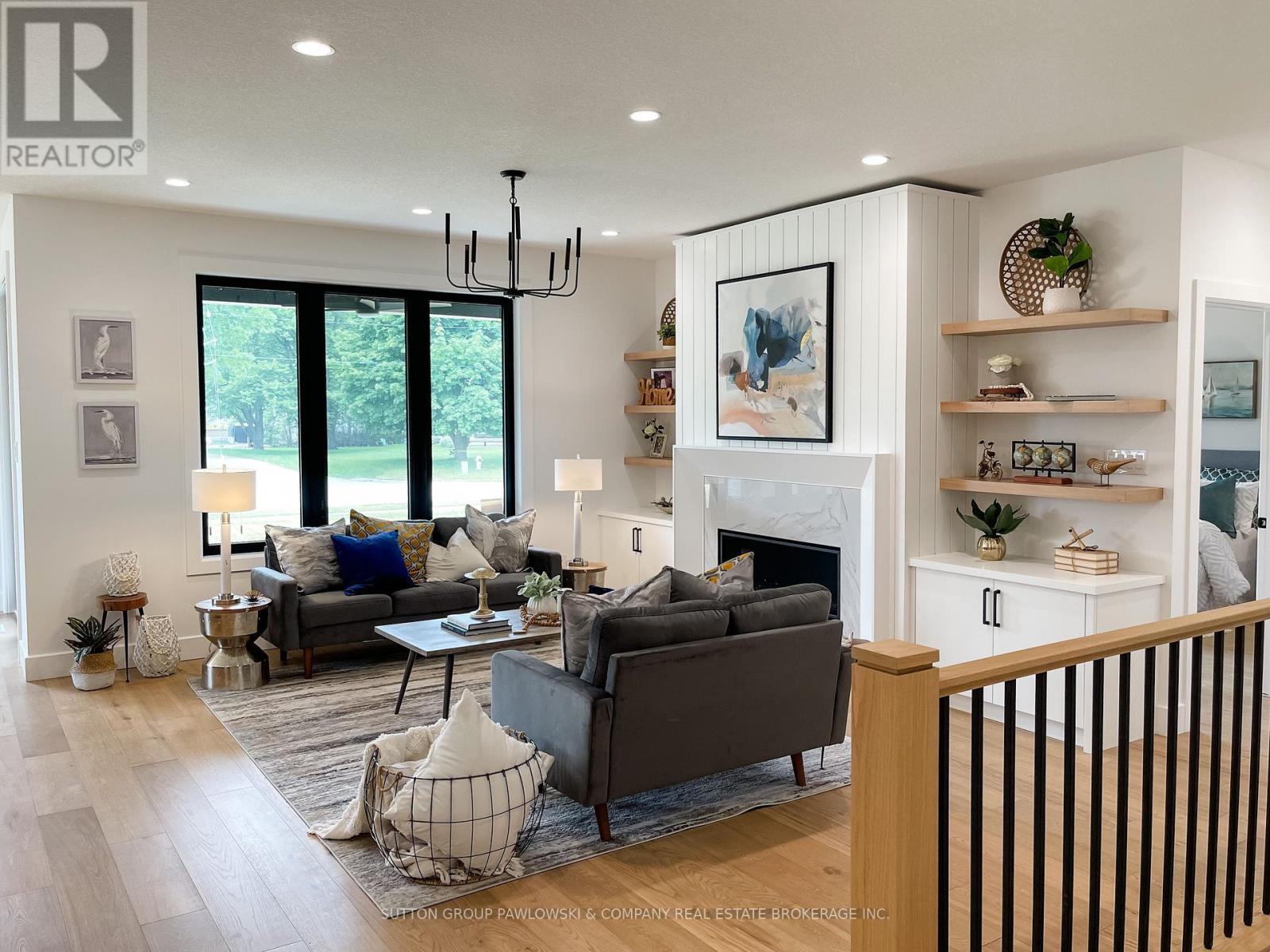 Lot #41 - 22 Sullivan Street, South Huron (Stephen), ON - Indoor Photo Showing Living Room With Fireplace