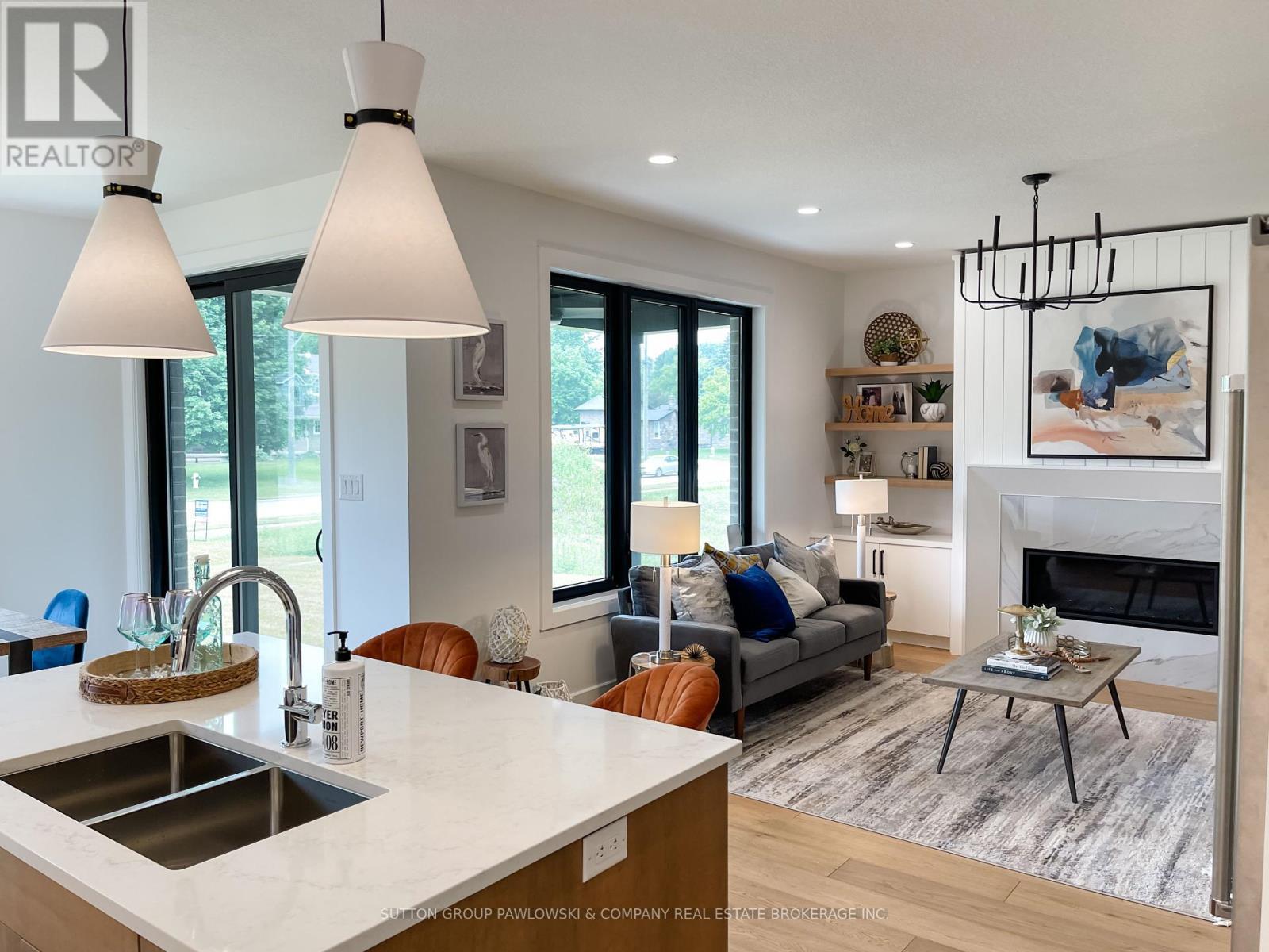 Lot #41 - 22 Sullivan Street, South Huron (Stephen), ON - Indoor With Fireplace