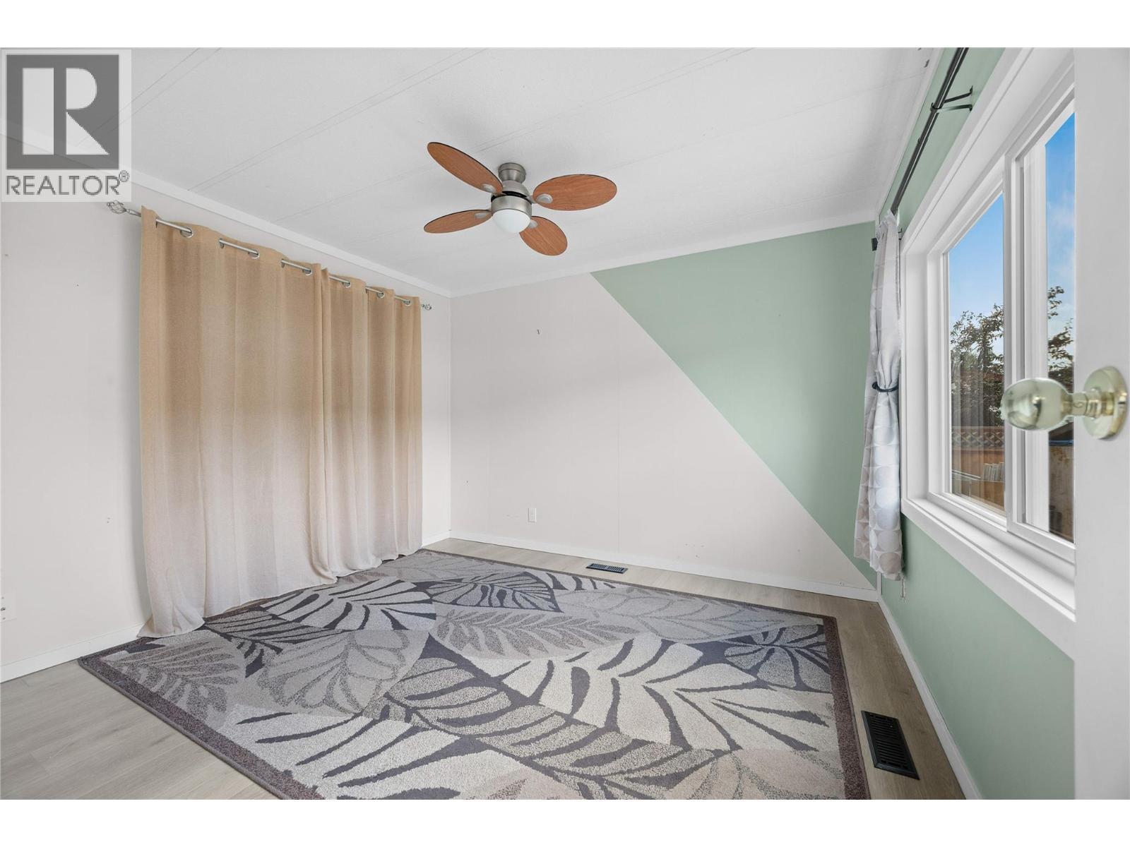 Second bedroom with ceiling fan - 1881 Boucherie Road Unit# 59, Westbank, BC