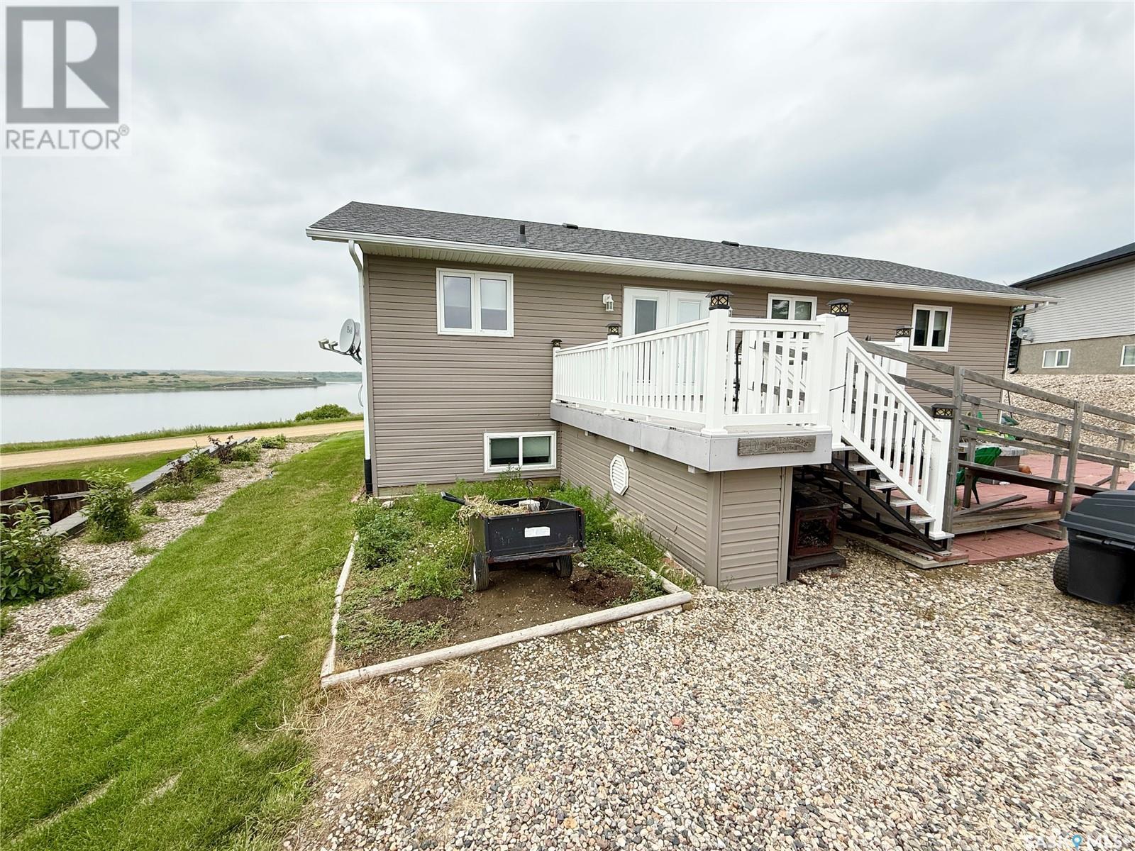 4 Island View, Cymri Rm No. 36, SK - Outdoor With Deck Patio Veranda With Exterior