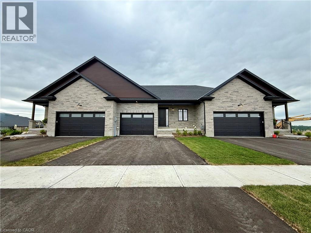 93 Bedell Drive, Drayton, ON - Outdoor With Facade