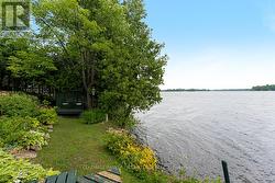 Meandering path by the shore and thru the gardens -