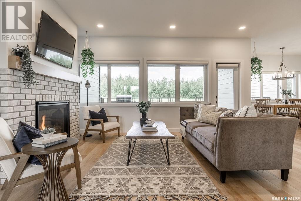 10 Applewood Place, Corman Park Rm No. 344, SK - Indoor Photo Showing Living Room With Fireplace