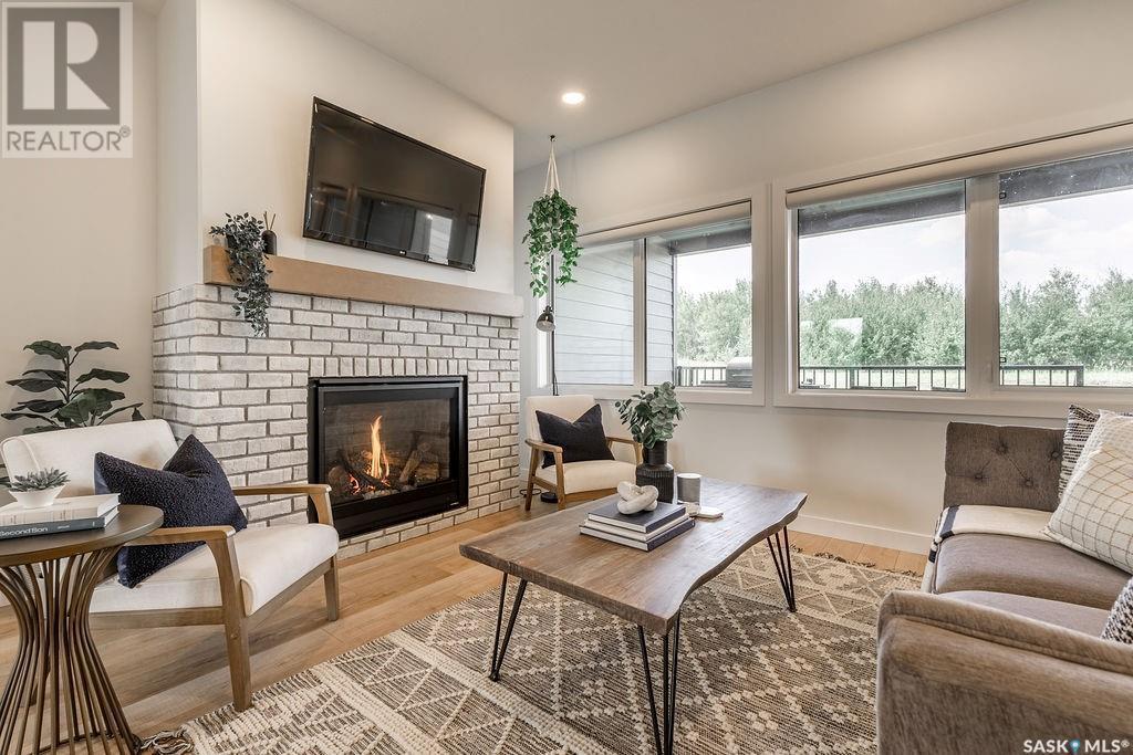 10 Applewood Place, Corman Park Rm No. 344, SK - Indoor Photo Showing Living Room With Fireplace
