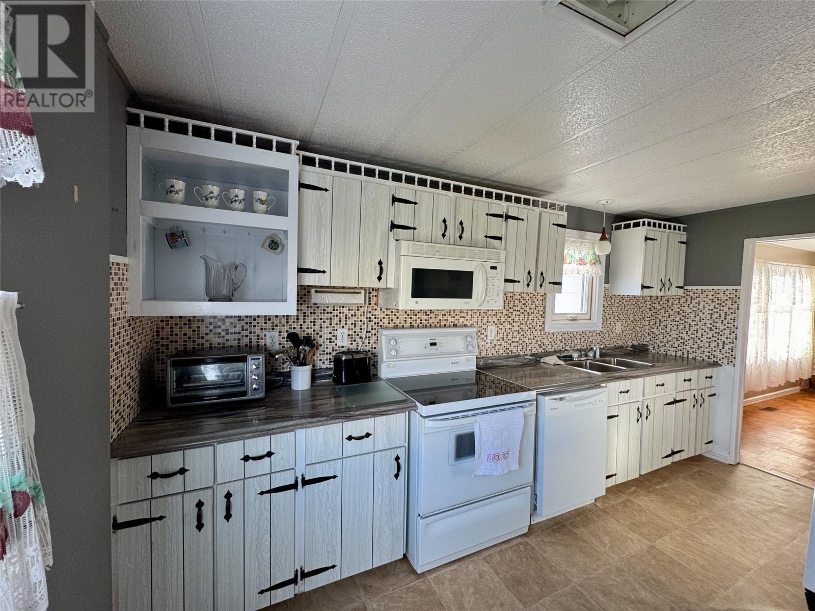 146 Main Street, Newtown, NL - Indoor Photo Showing Kitchen With Double Sink