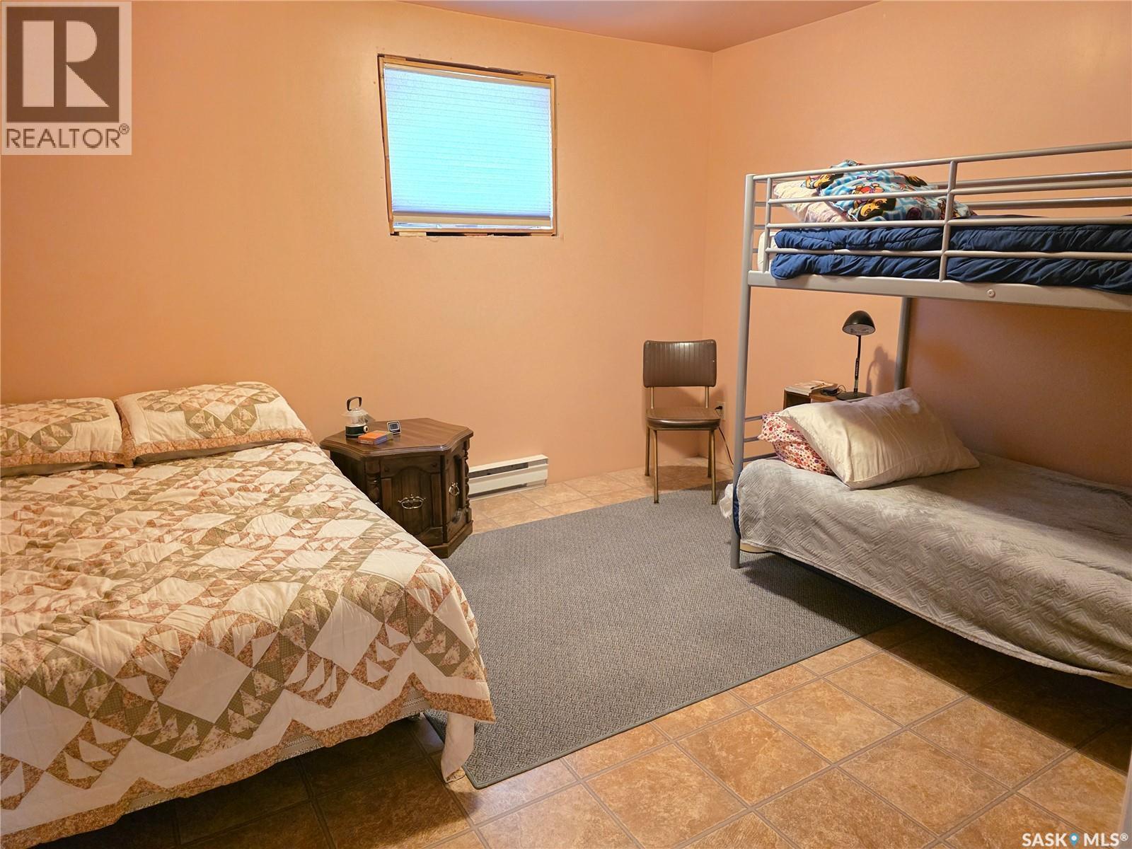 504 Mistusinne Crescent, Mistusinne, SK - Indoor Photo Showing Bedroom