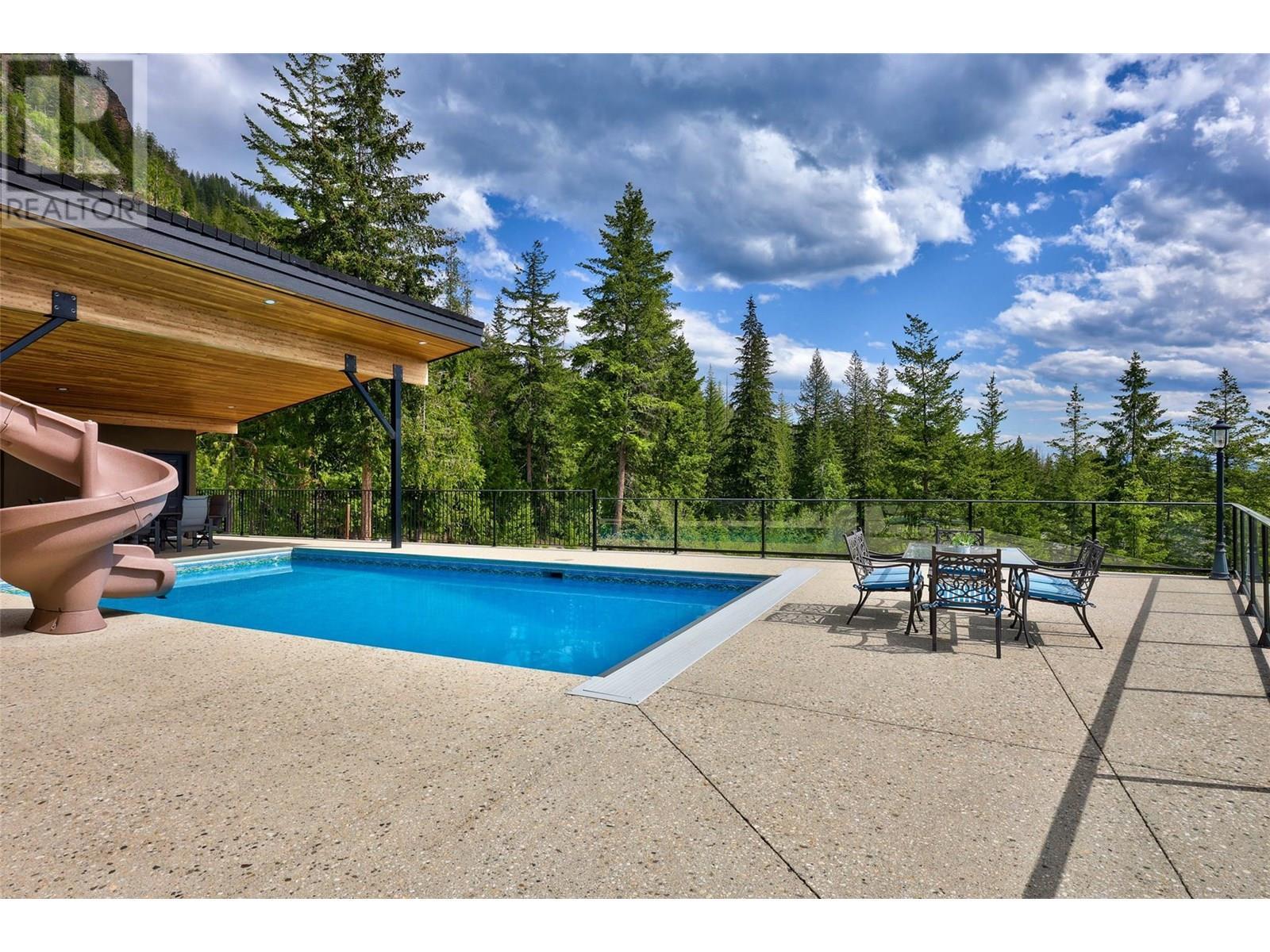 3655 Mcbride Road, Blind Bay, BC - Outdoor With In Ground Pool