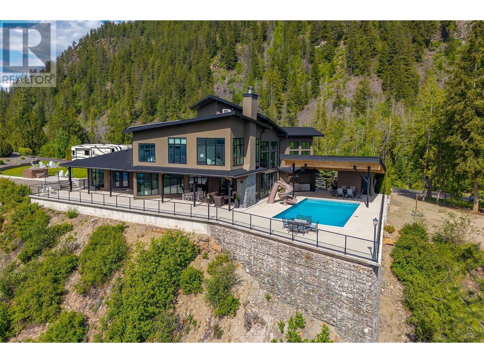 3655 Mcbride Road, Blind Bay, BC - Outdoor With In Ground Pool