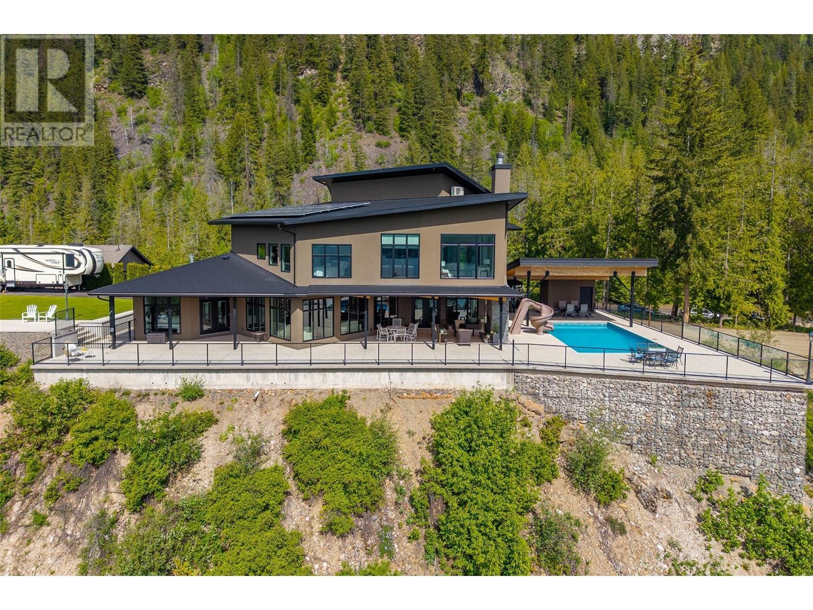 3655 Mcbride Road, Blind Bay, BC - Outdoor With In Ground Pool