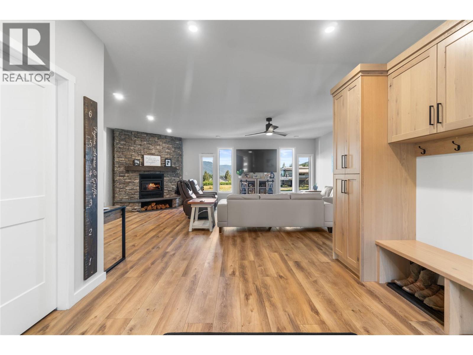 Main Entrance - 22 Parsons Road, Mara, BC - Indoor With Fireplace