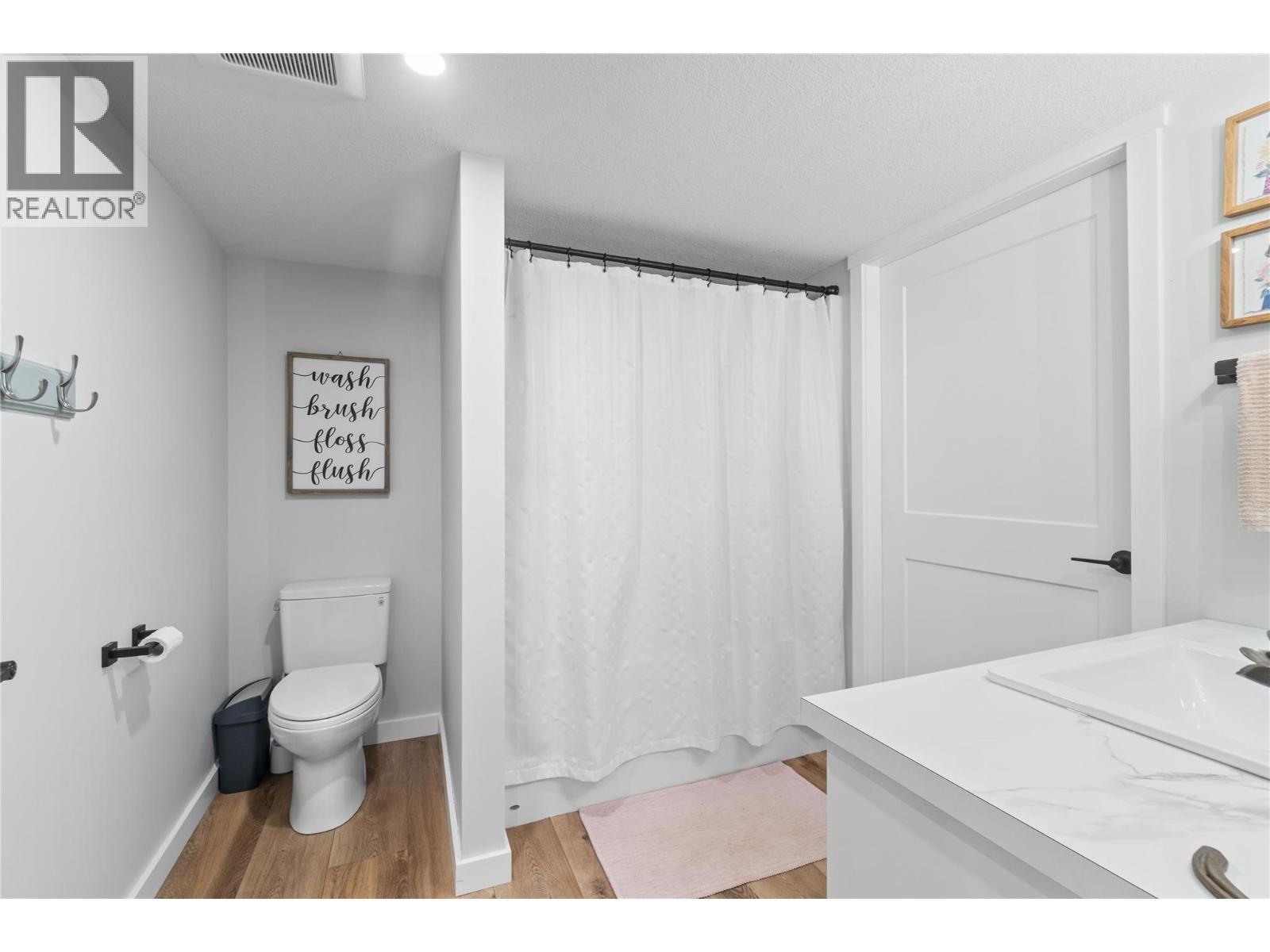 Lower Level Bathroom - 22 Parsons Road, Mara, BC - Indoor Photo Showing Bathroom