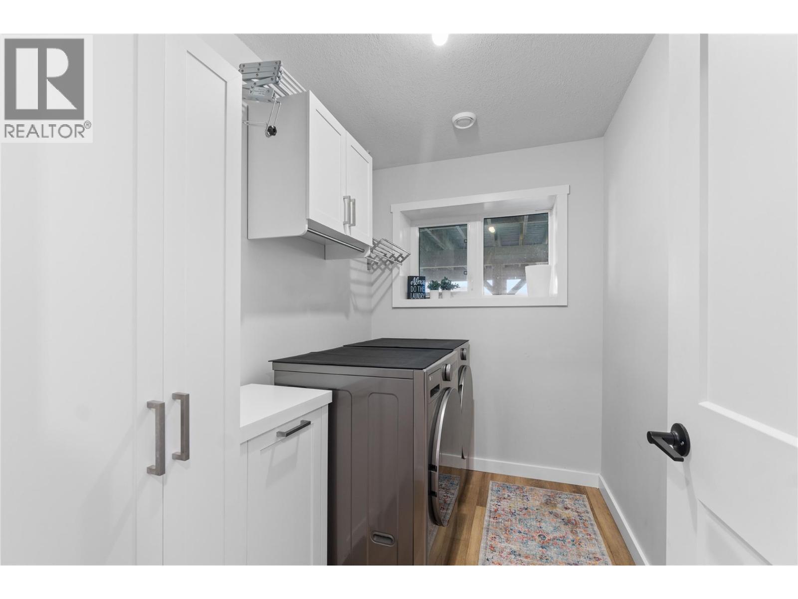 22 Parsons Road, Mara, BC - Indoor Photo Showing Laundry Room