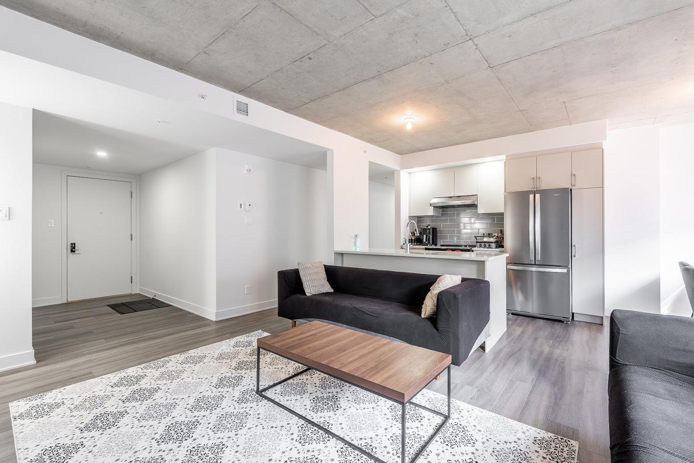 Overall view - 504-1431 Av. De La Gare, Mascouche, QC - Indoor Photo Showing Living Room