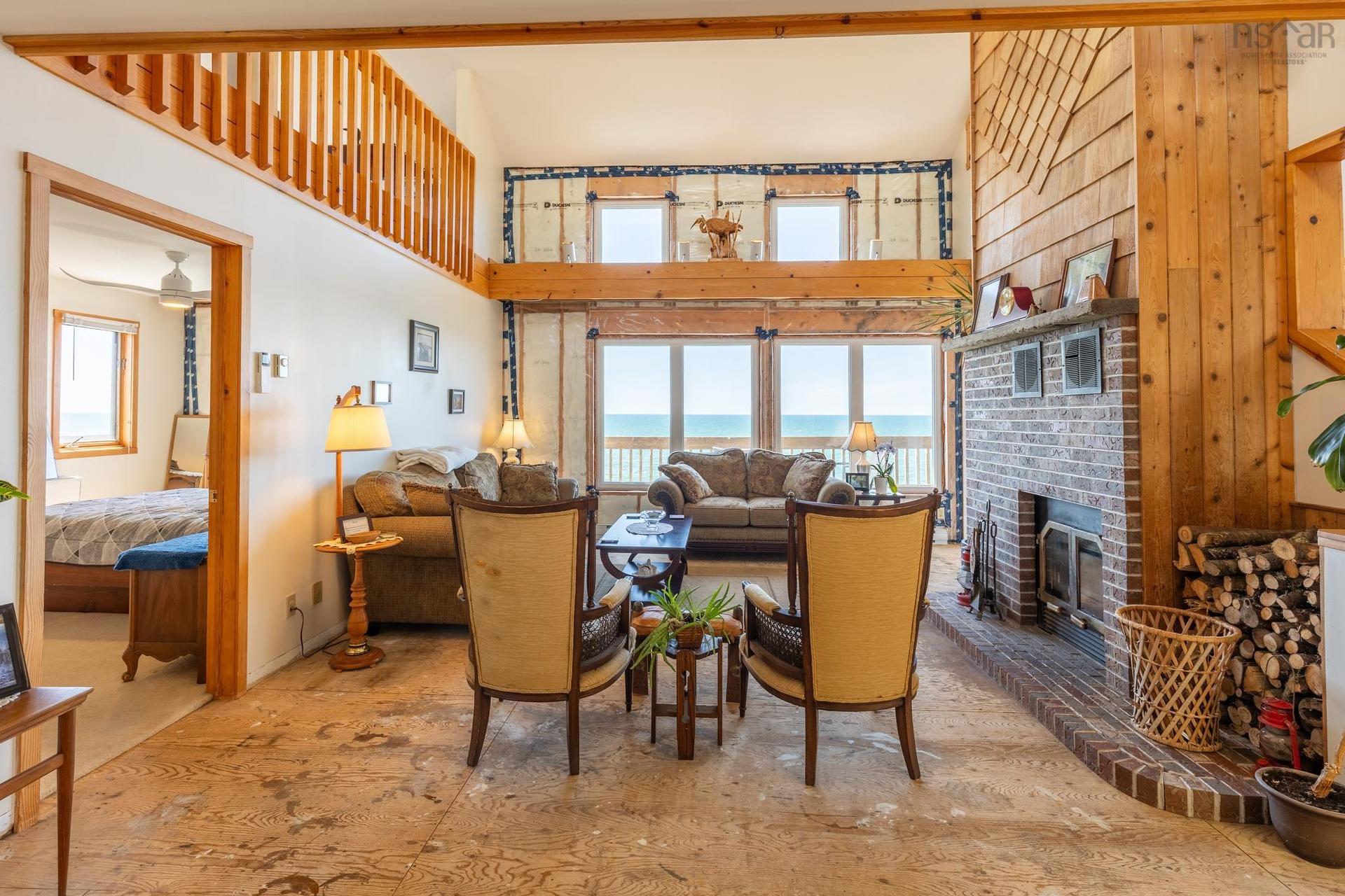194 Thomas Road, Cape Forchu, NS - Indoor With Fireplace