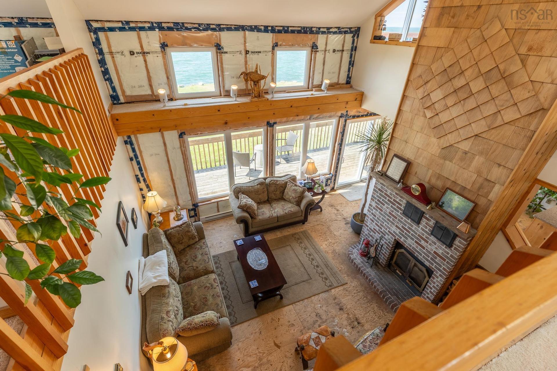 194 Thomas Road, Cape Forchu, NS - Indoor With Fireplace