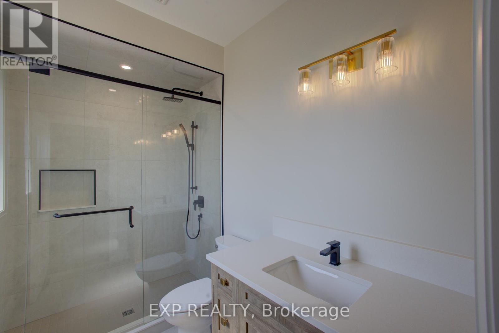 Photos of a previously finished unit. - 93 Bedell Drive, Mapleton, ON - Indoor Photo Showing Bathroom