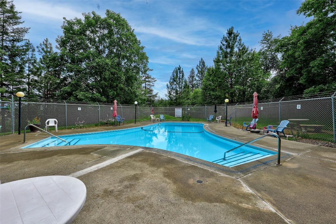 42-1469 Springhill Drive, Kamloops, BC - Outdoor With In Ground Pool With Backyard