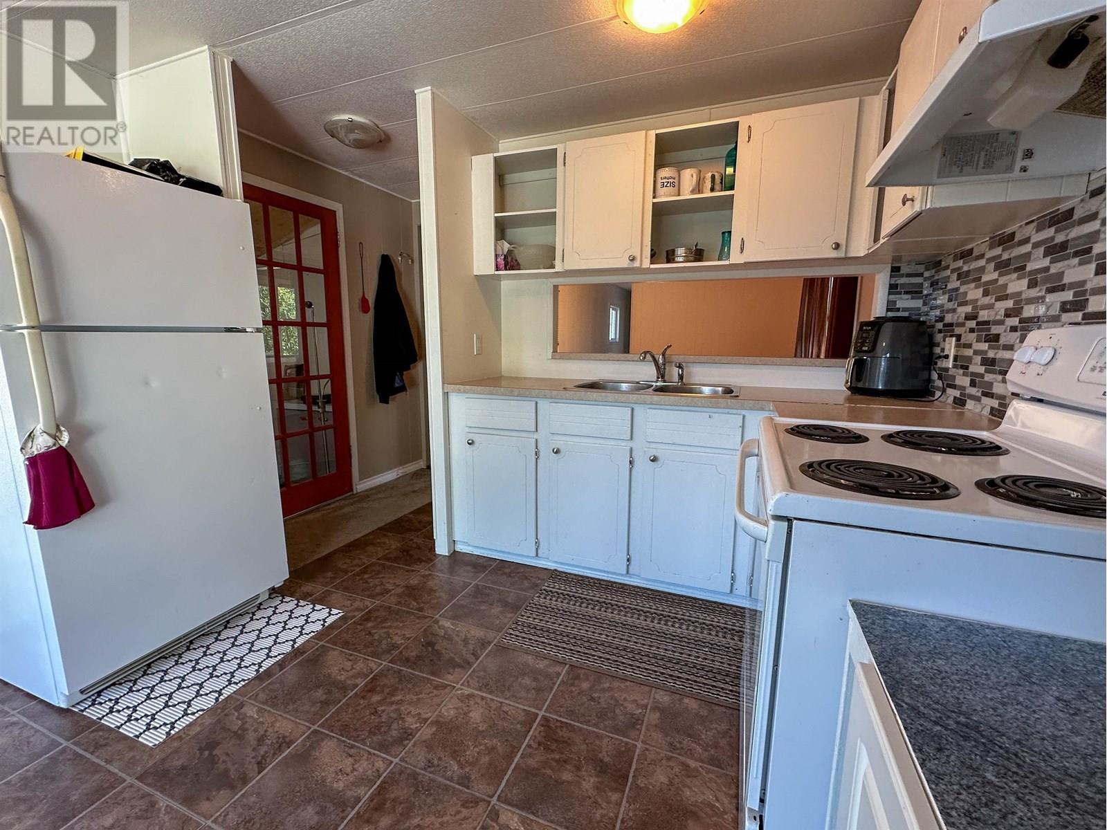 7 2091 E 16 Highway, Vanderhoof, BC - Indoor Photo Showing Kitchen With Double Sink