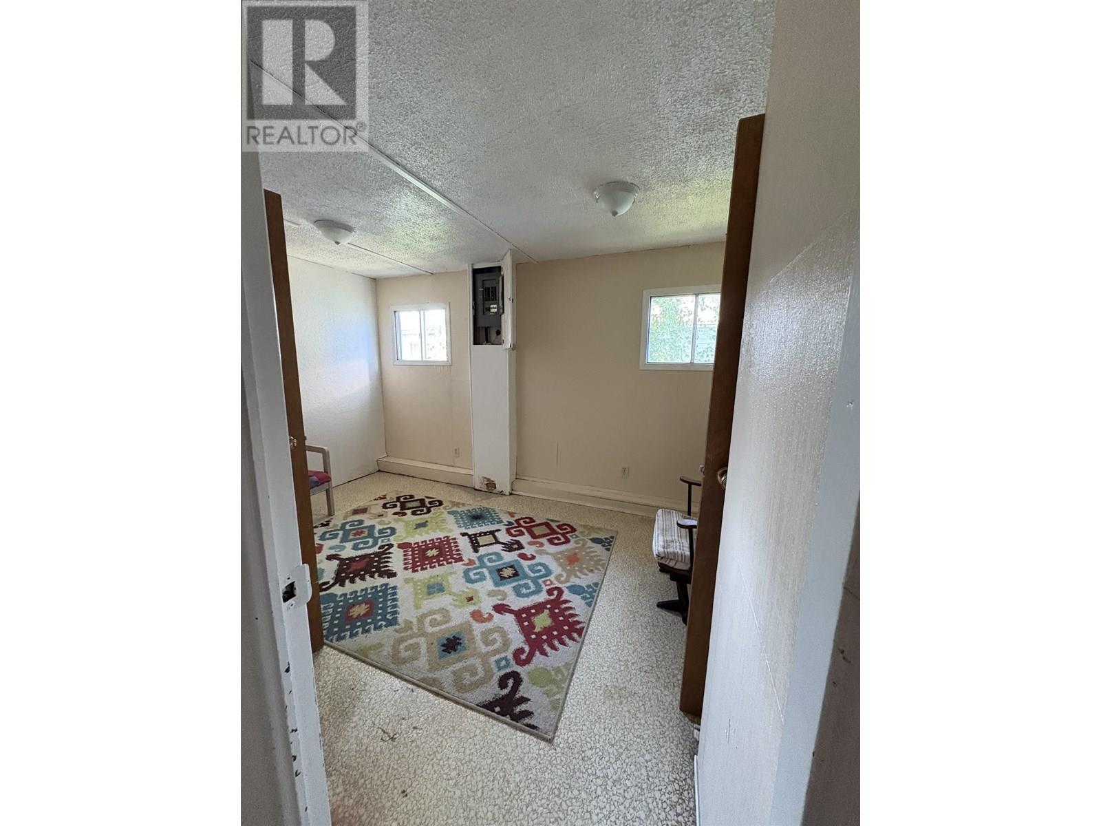 10713-10715 Learmonth Street, Hudsons Hope, BC - Indoor Photo Showing Other Room
