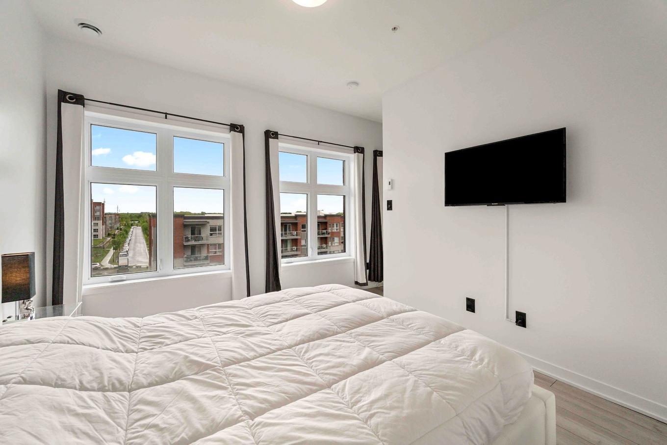 Chambre à coucher principale - 500-9175 Rue Lennon, Brossard, QC - Indoor Photo Showing Bedroom