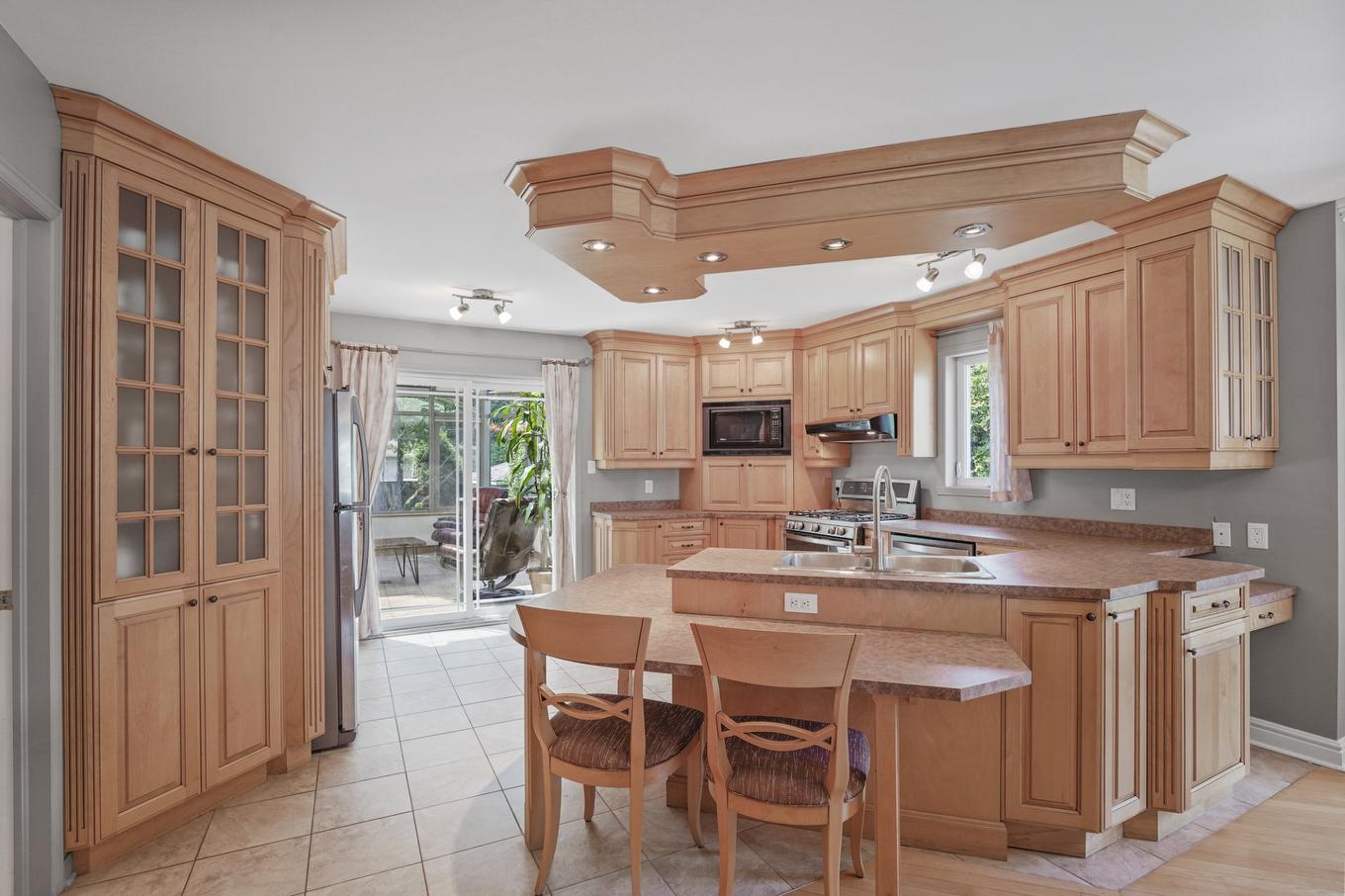 Cuisine - 22 Rue Des Doublons, Blainville, QC - Indoor Photo Showing Kitchen With Double Sink