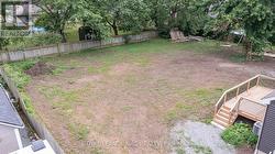 large yard, tree to right on new lot -