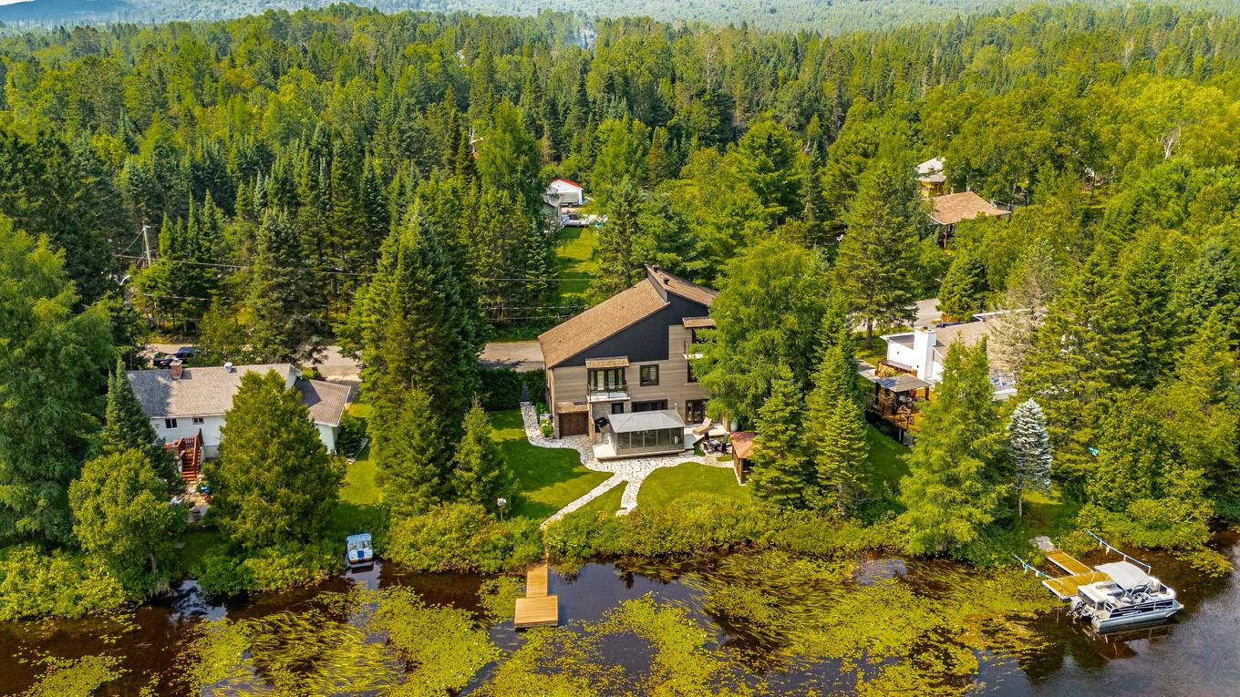 Back facade - 5619 Ch. Monjeau, Sainte-Agathe-Des-Monts, QC - Outdoor With Body Of Water With View