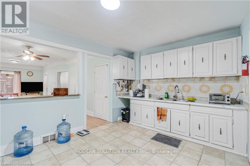 204 Sherman Avenue, Hamilton, ON - Indoor Photo Showing Kitchen With Double Sink