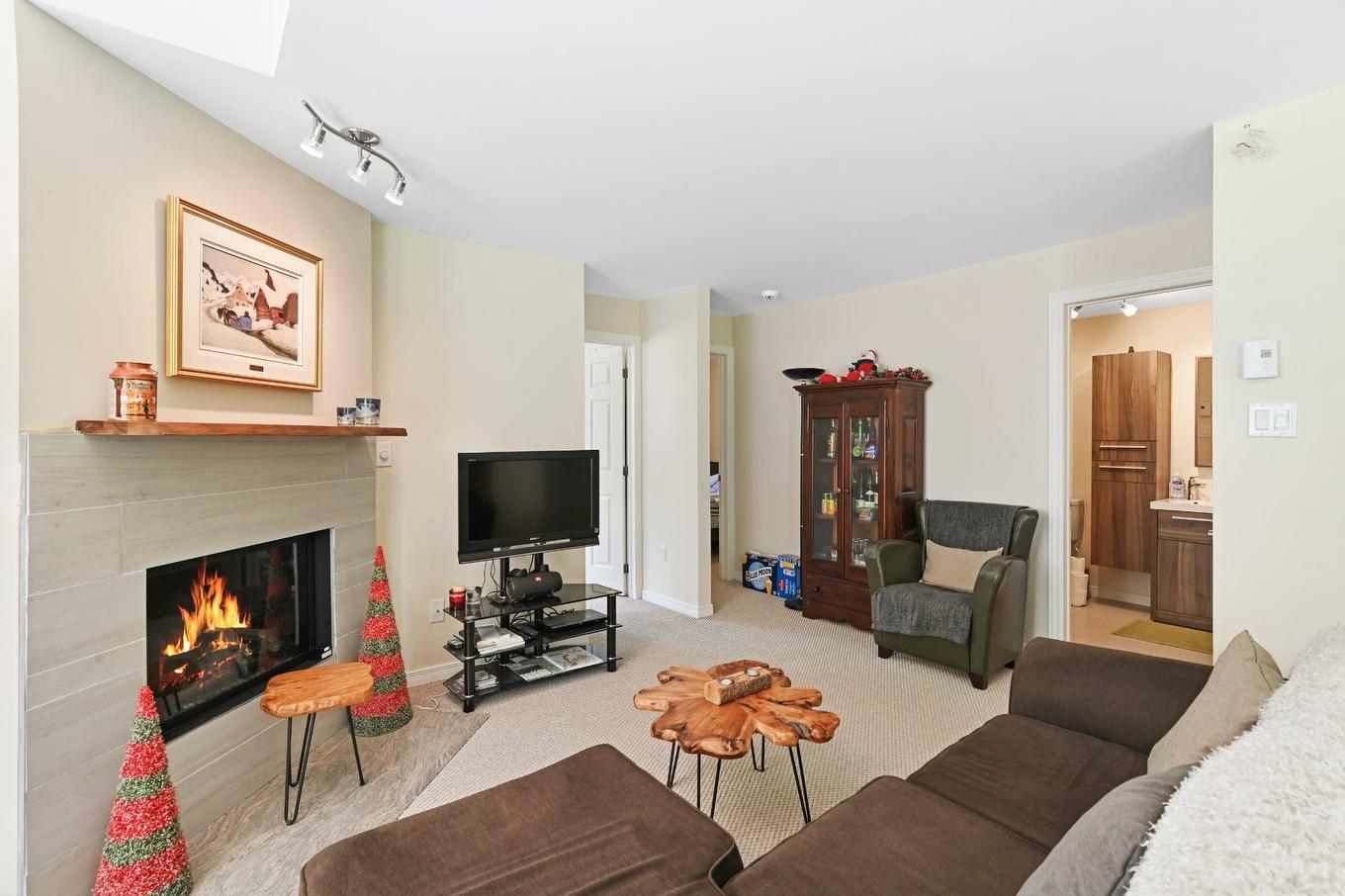 Overall view - 134 - 134A Ch. Bernier, Sutton, QC - Indoor Photo Showing Living Room With Fireplace