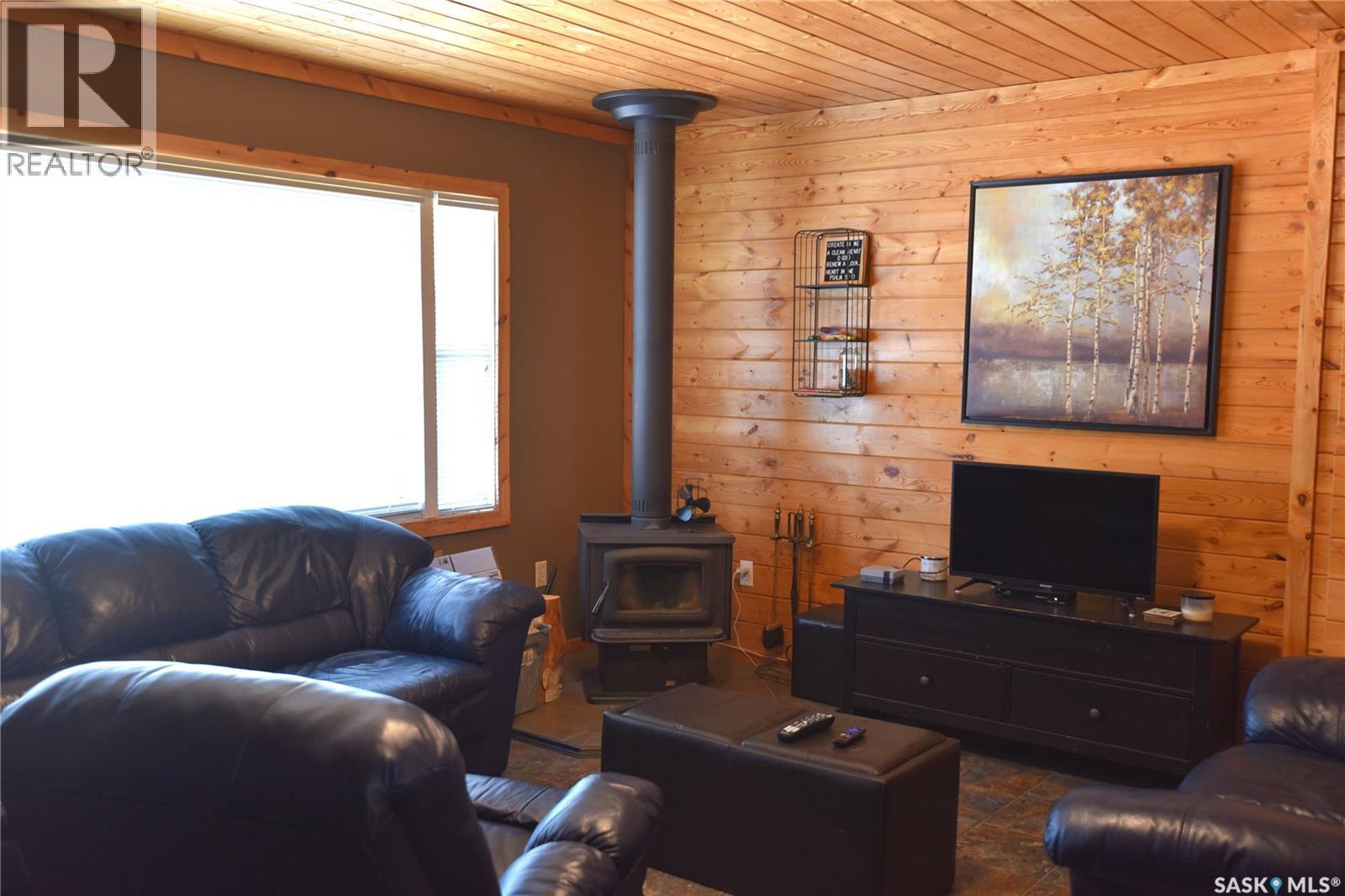 217 Birch Drive, Tobin Lake, SK - Indoor Photo Showing Living Room With Fireplace