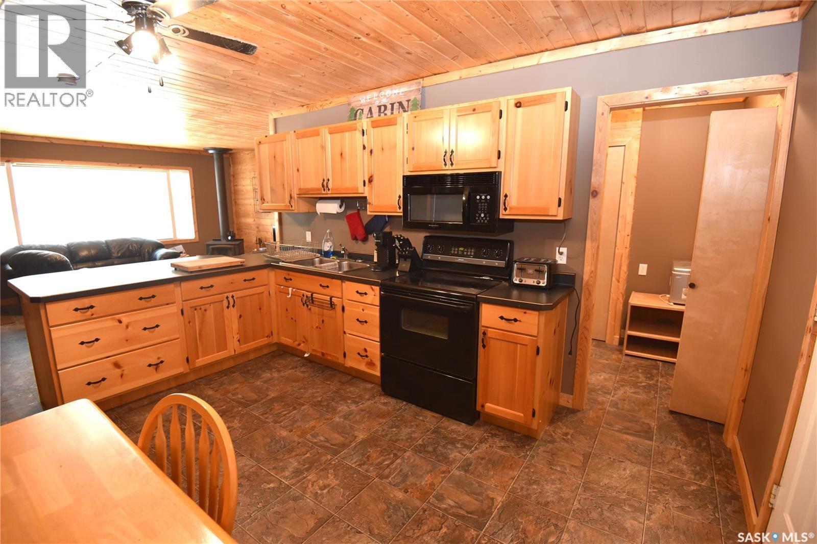 217 Birch Drive, Tobin Lake, SK - Indoor Photo Showing Kitchen With Double Sink