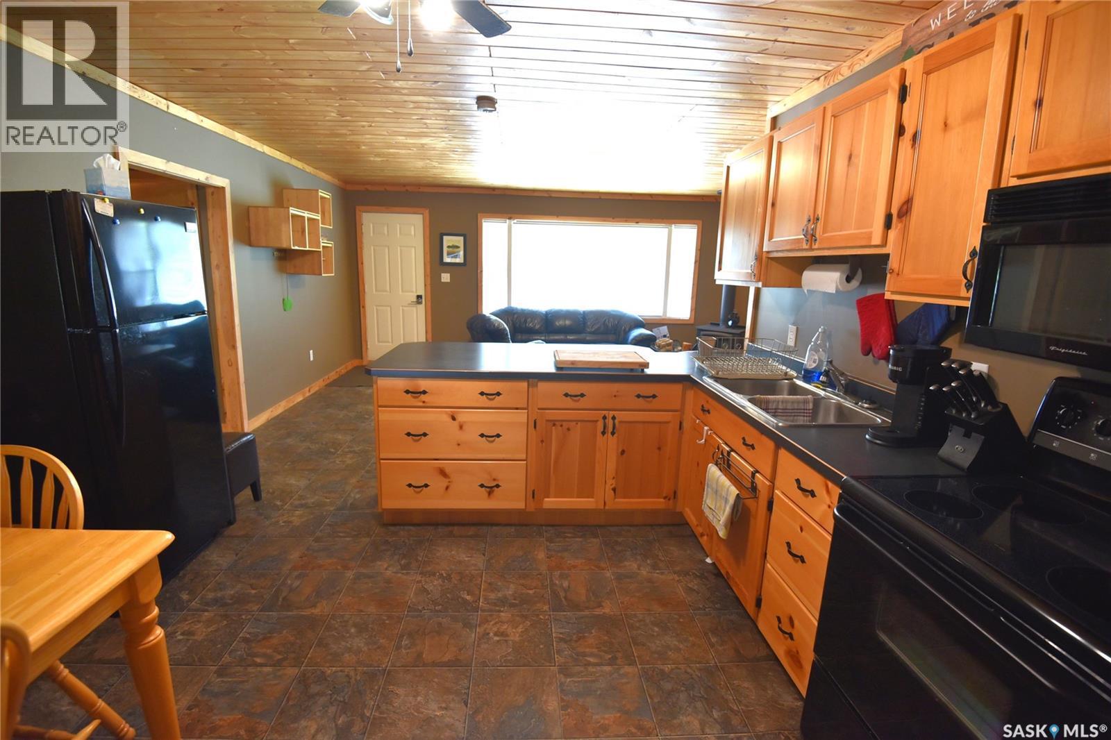 217 Birch Drive, Tobin Lake, SK - Indoor Photo Showing Kitchen With Double Sink