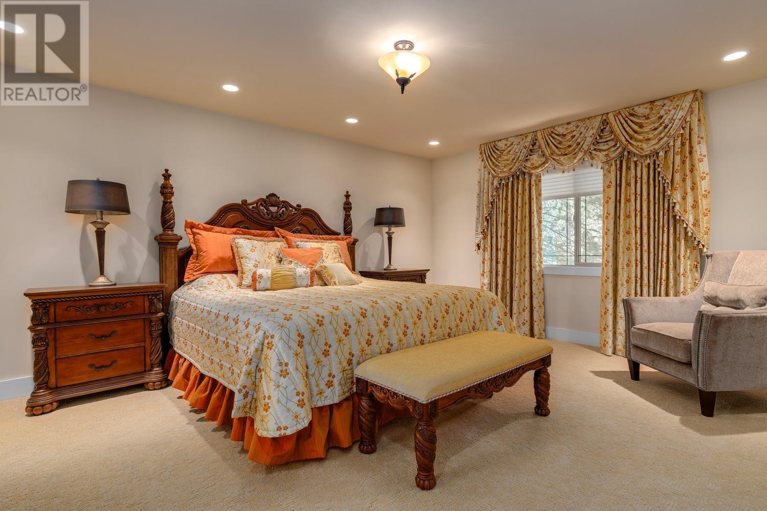 Main house - 8566 Eacrett Road, Dry Gulch, BC - Indoor Photo Showing Bedroom