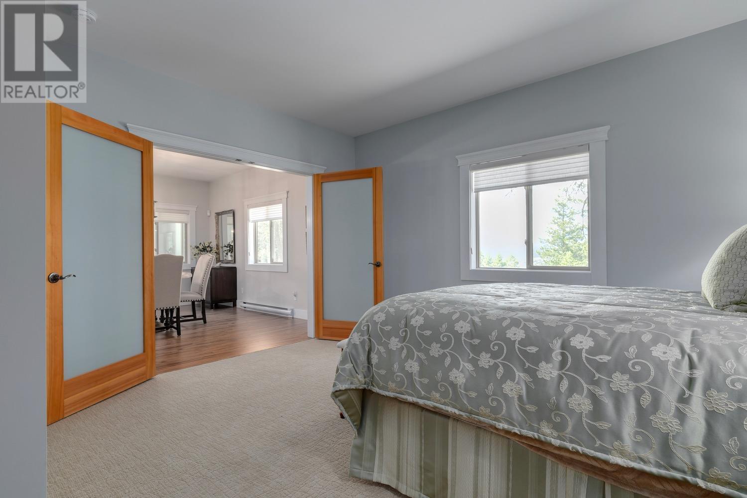 Guest house - 8566 Eacrett Road, Dry Gulch, BC - Indoor Photo Showing Bedroom