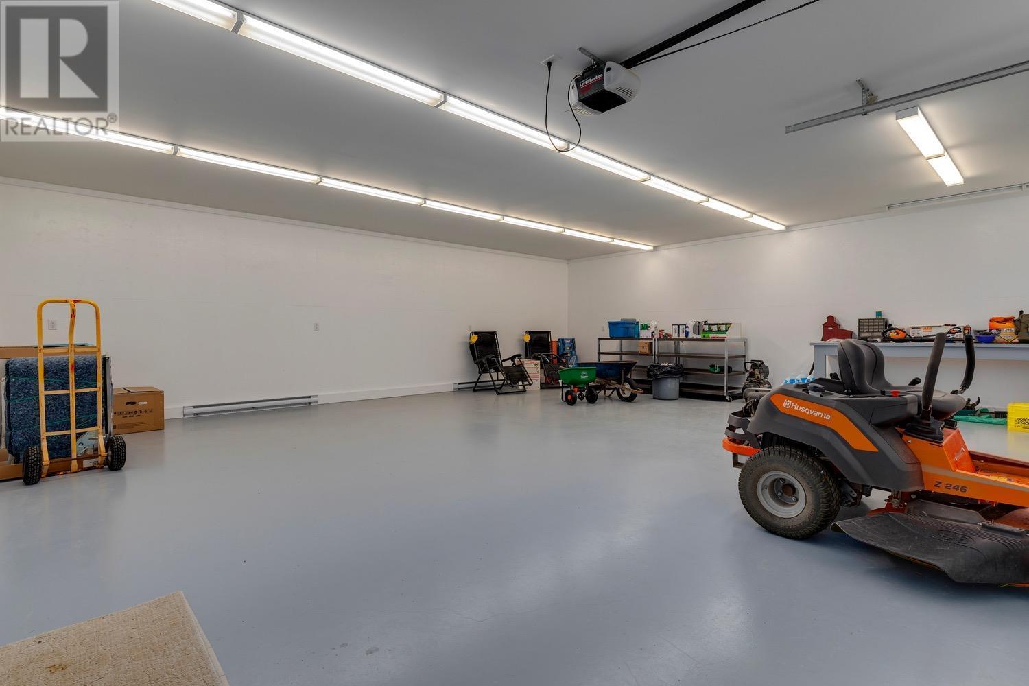 8566 Eacrett Road, Dry Gulch, BC - Indoor Photo Showing Garage